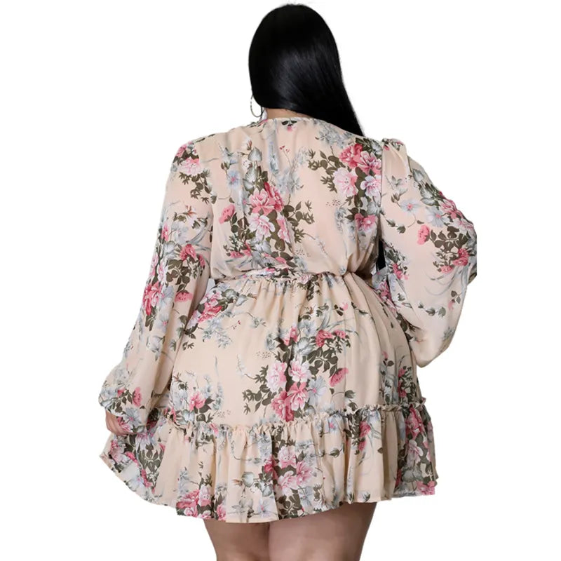 Robe grande taille en mousseline fleurie – Col V, manches longues évasées